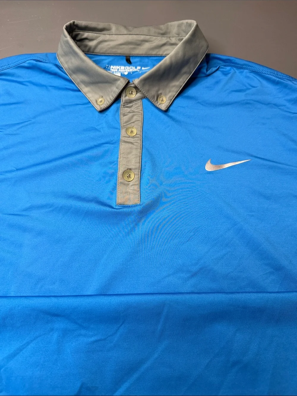 Nike Golf Men’s Royal Blue Performance Polo with Gray Accents. Size: large.